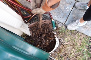 Compost coming out of tumbler